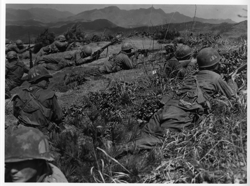 United States Soldiers Laying in Grass with Weapons | Harry S. Truman