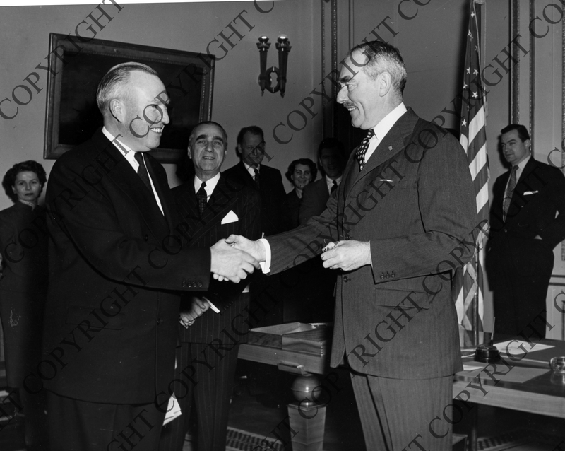 Dean Acheson is greeted by a gentleman at the Paris, France Conference ...