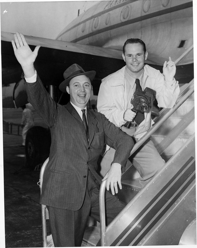 Bjorn Bjornson, a Canadian reporter, and friend on an airplane stairway ...