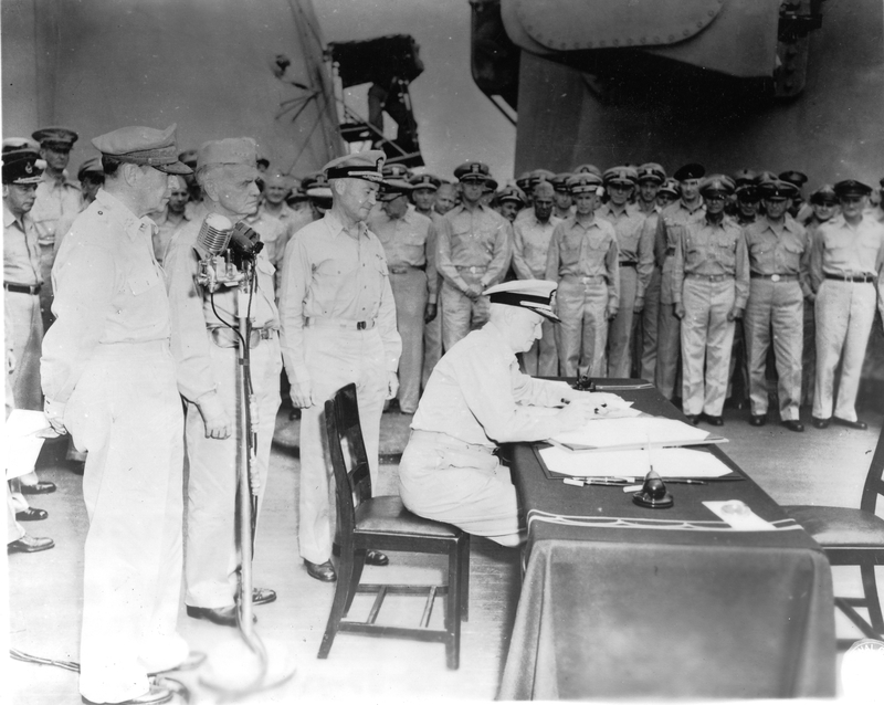 Admiral Chester W. Nimitz Signs the Japanese Surrender for the United ...