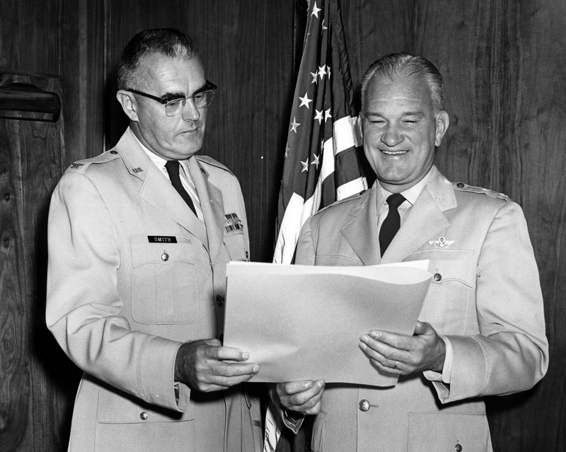 General Robert Landry Holds Paper With General Smith | Harry S. Truman