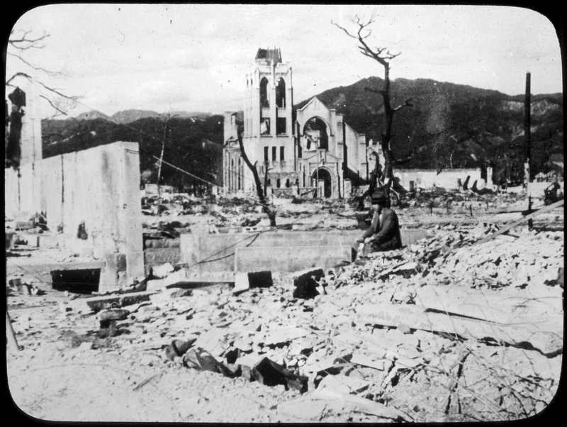 Man Sitting Among The Destruction In Hiroshima | Harry S. Truman