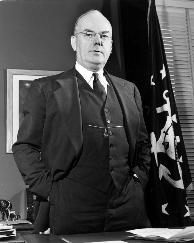 Portrait of John Snyder standing at his desk | Harry S. Truman