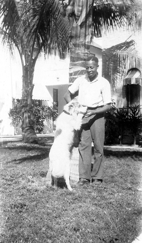 African-American man and a dog together | Harry S. Truman