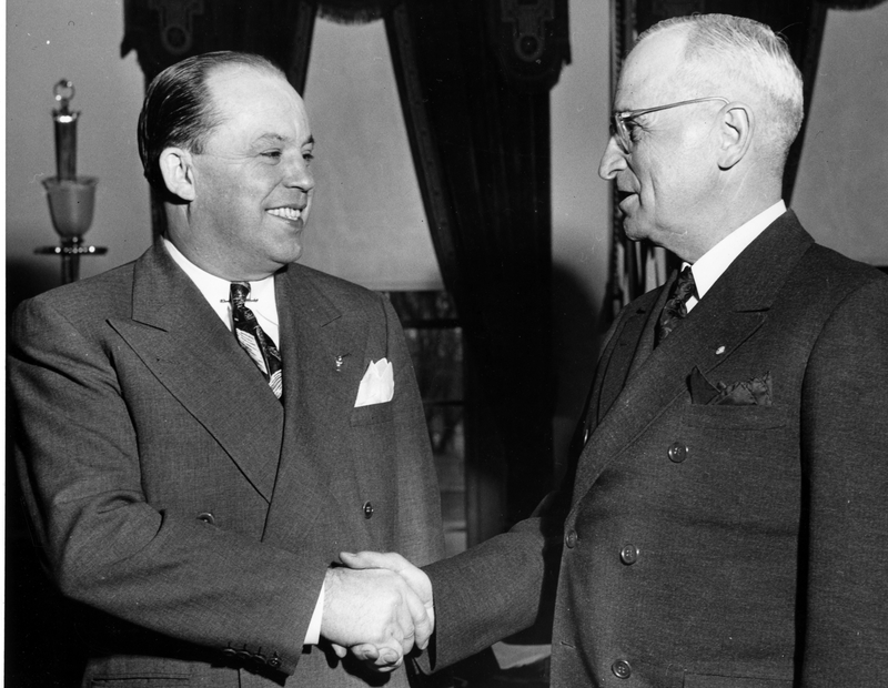 American Legion National Commander Paul Griffith shaking hands with ...