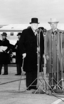 Prime Minister Winston Churchill and President Harry S. Truman stand in front of microphones at Washington National Airport