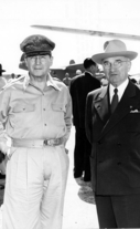 General Douglas MacArthur and President Harry S. Truman stand together at Wake Island.